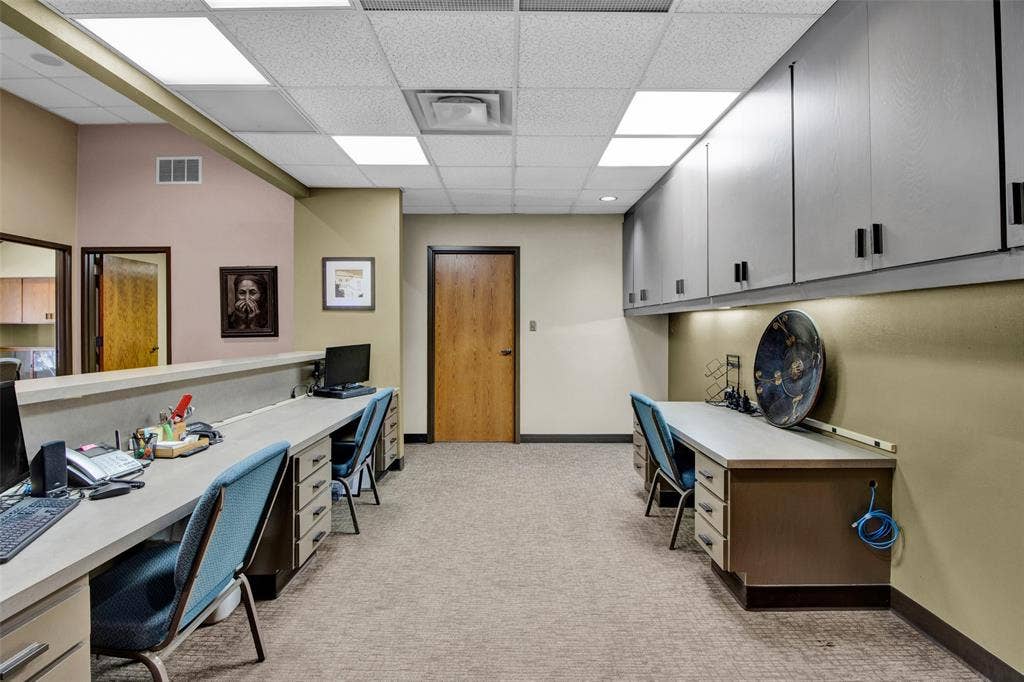 3210 W Northwest Loop 323, Tyler, TX 75702 Recessed lighting, drop ceiling, wall-mounted cabinetry, built-in desks, and carpeted flooring