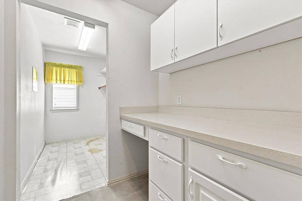 Storage area and counter space off the utility room