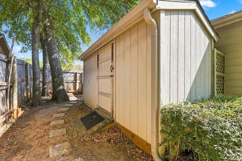 Storage shed on side yard