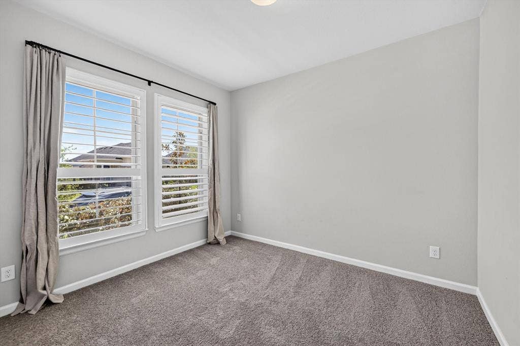 5308 Tupper Avenue, Fate, TX 75087 Dual windows with white plantation shutters
