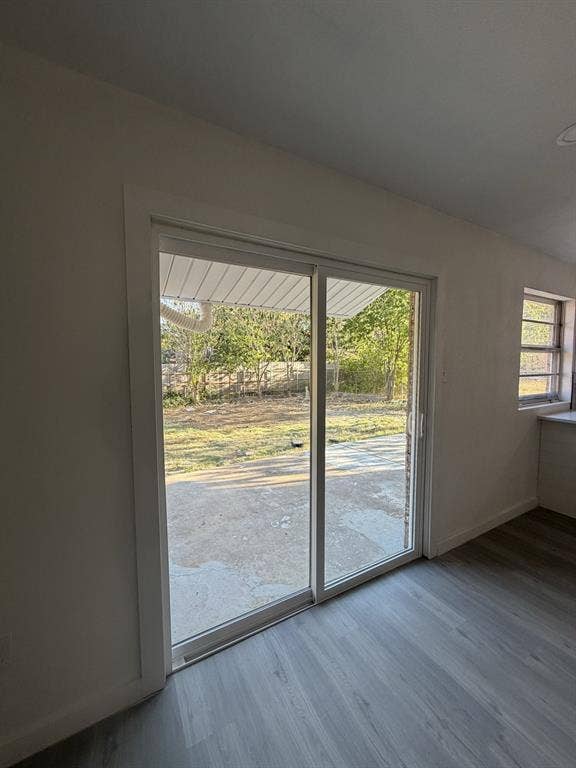 806 S Atkerson Lane, Euless, TX 76040 Sliding glass doors opening to a concrete patio