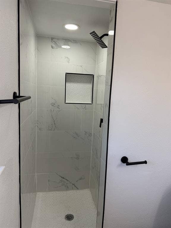 806 S Atkerson Lane, Euless, TX 76040 Glass shower enclosure with large format wall tile