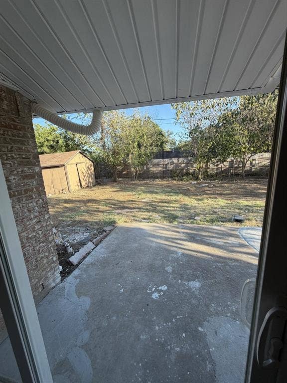 806 S Atkerson Lane, Euless, TX 76040 Covered patio overlooking the fenced back yard