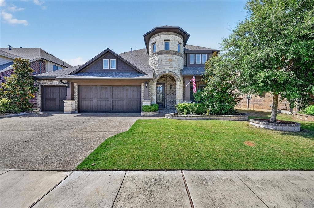 316 Jernigan Drive, Euless, TX 76040 Stone and brick exterior with a prominent turret feature
