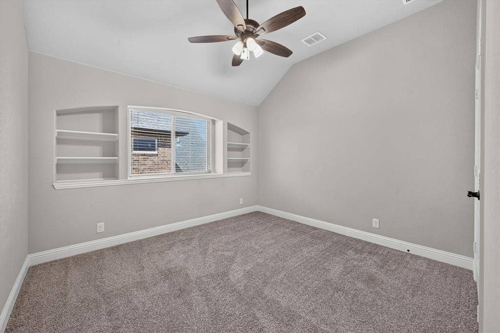 316 Jernigan Drive, Euless, TX 76040 Room with vaulted ceiling, ceiling fan, and built-in shelving
