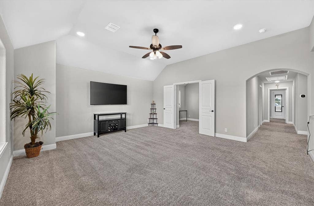 316 Jernigan Drive, Euless, TX 76040 Upstairs Vaulted ceiling with recessed lighting, ceiling fan, and light grey wall finishes