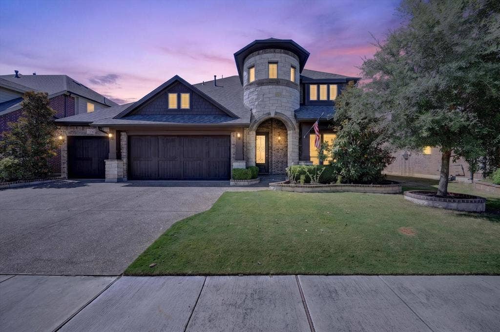 316 Jernigan Drive, Euless, TX 76040 Stone and brick exterior with a distinctive turret feature