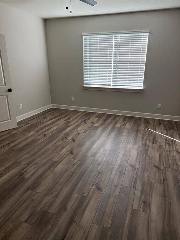 1001 Calhoun Drive, Anna, TX 75409 Wood-finish flooring, neutral wall tones, window with horizontal blinds, and a ceiling fan with light fixture