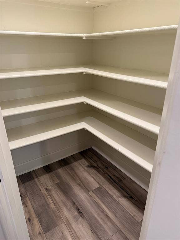 1001 Calhoun Drive, Anna, TX 75409 Built-in shelving with multiple levels and wood-finish flooring