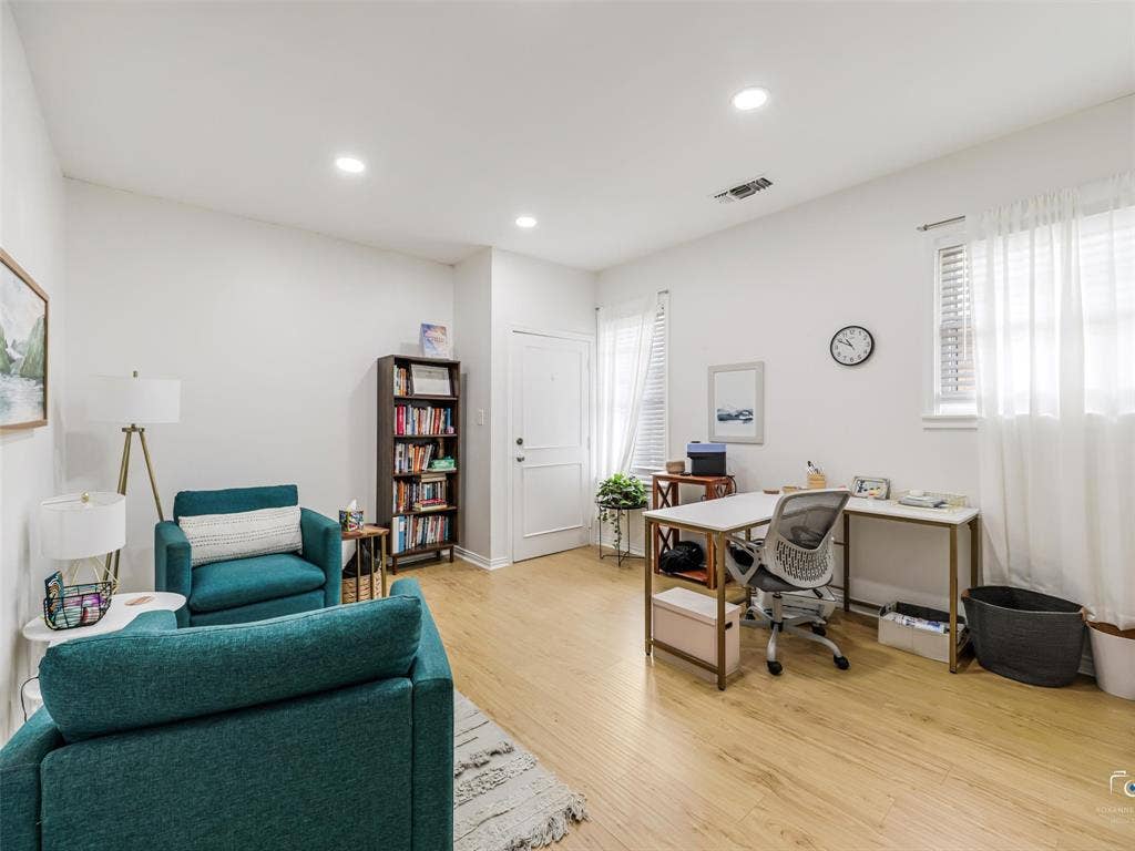 4310 Gaston Avenue, #103, Dallas, TX 75246 Light wood-finish flooring, recessed lighting, and white walls create a bright interior