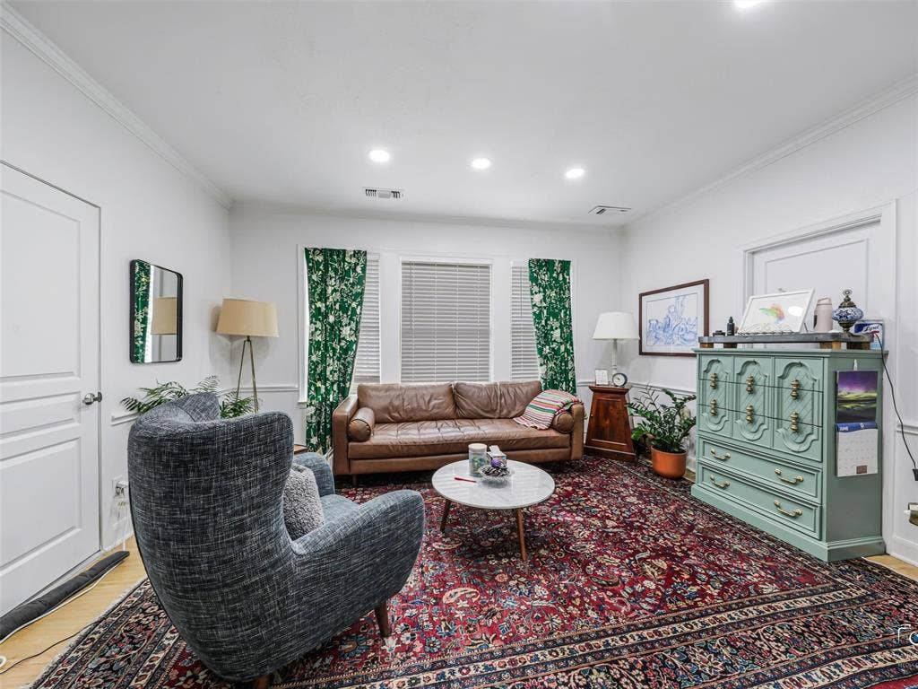 4310 Gaston Avenue, #103, Dallas, TX 75246 Recessed ceiling lighting, crown molding, wood-finish flooring, and white interior doors
