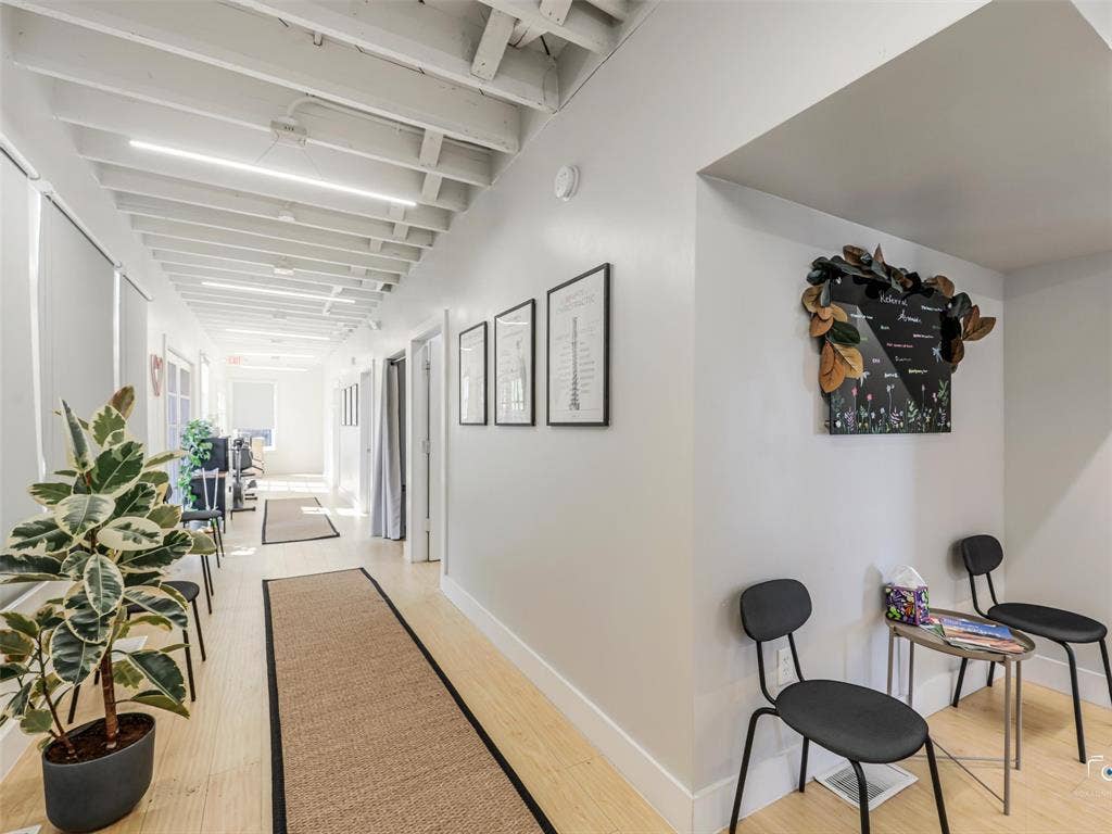 4310 Gaston Avenue, #103, Dallas, TX 75246 Recessed lighting illuminates the exposed beam ceiling