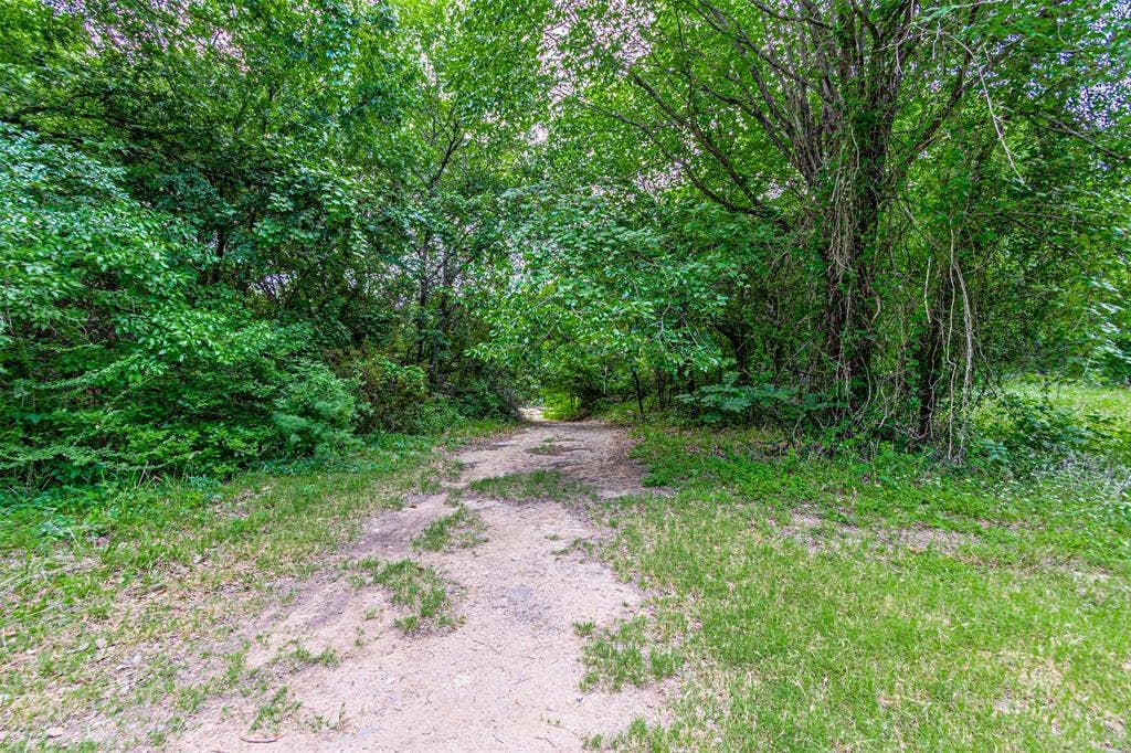 3018 River View Court, Granbury, TX 76048 Wooded lot with mature trees and natural landscaping