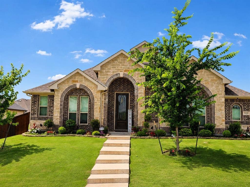 5225 Rowlan Row, Midlothian, TX 76065 Brick and stone exterior with arched accents