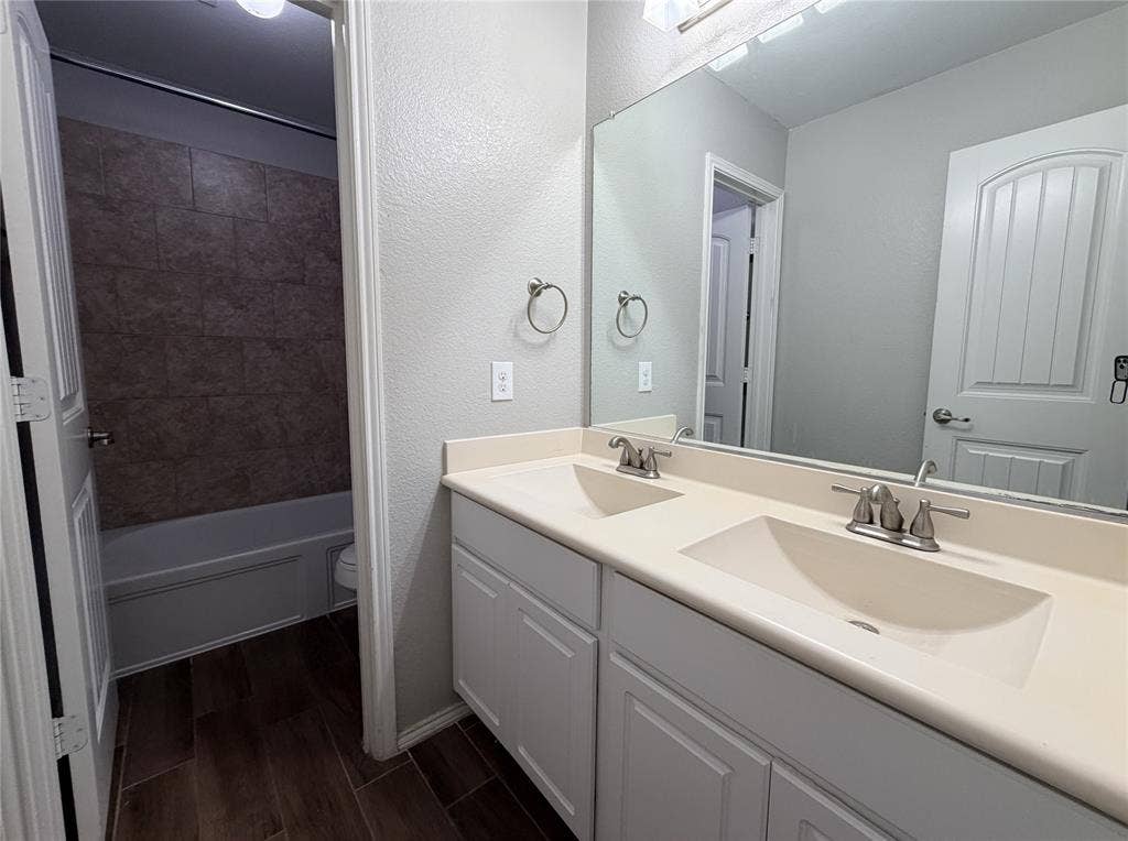 4103 Portrush Drive, Heartland, TX 75126 Dual vanity with integrated sinks and brushed nickel fixtures