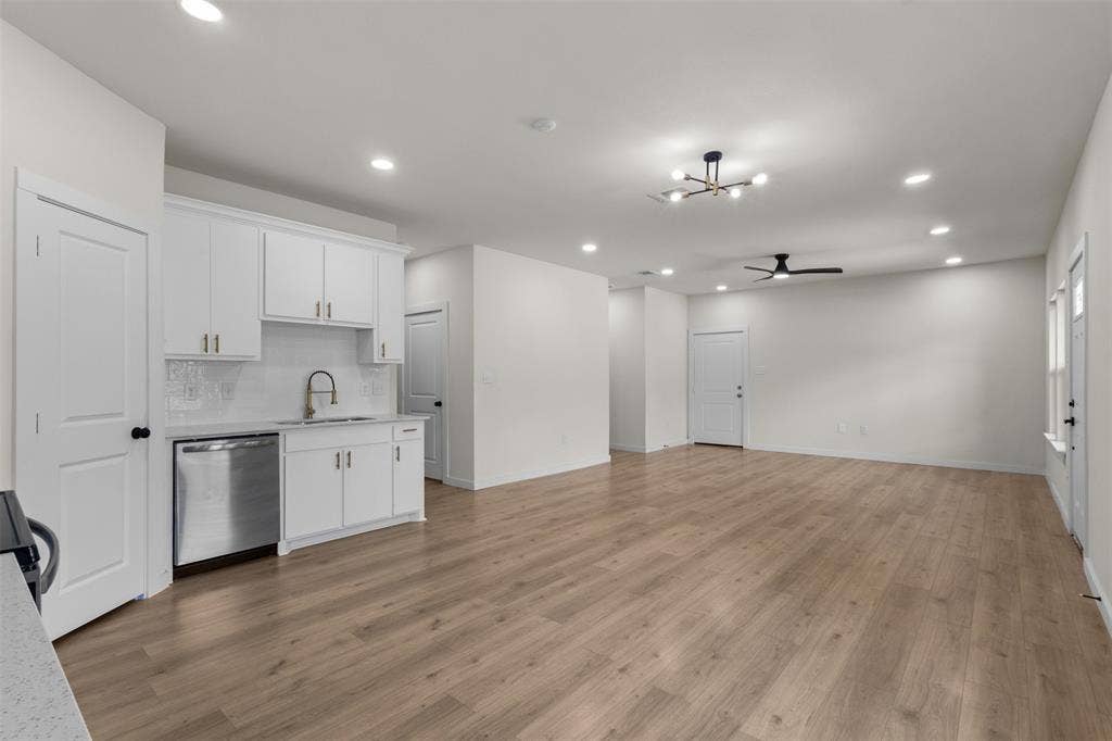 333 Levant Avenue, Dallas, TX 75217 Open-concept living space with wood-finish flooring, recessed lighting, and a modern ceiling fan