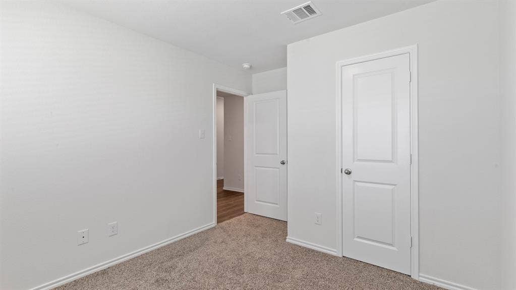 193 Brooks Street, Bullard, TX 75757 Neutral wall color, carpet flooring, multiple panel doors, recessed lighting, and wall outlets