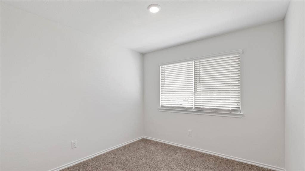 193 Brooks Street, Bullard, TX 75757 Recessed ceiling light, neutral wall paint, window with blinds, and carpeted flooring