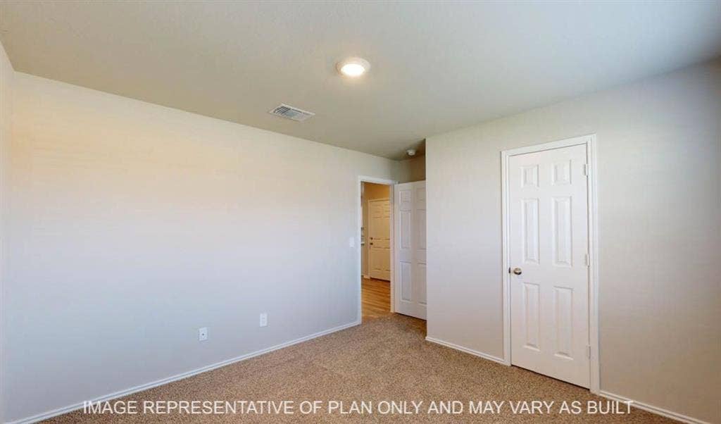 10217 Neptune Court, Waco, TX 76708 Neutral wall color, carpeted flooring, paneled interior door, and recessed ceiling lighting