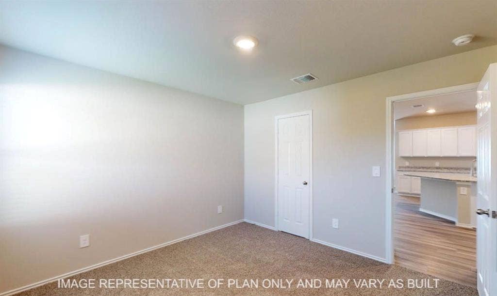 10217 Neptune Court, Waco, TX 76708 Carpet flooring with light-toned walls and an overhead flush-mount light