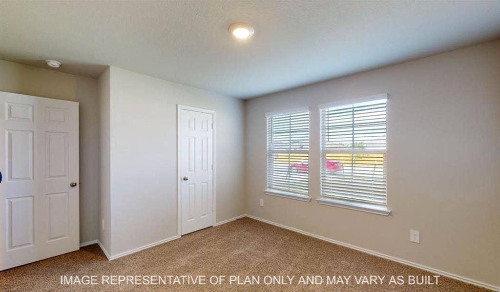 10217 Neptune Court, Waco, TX 76708 Neutral wall color, carpet flooring, recessed lighting, white doors, and window blinds