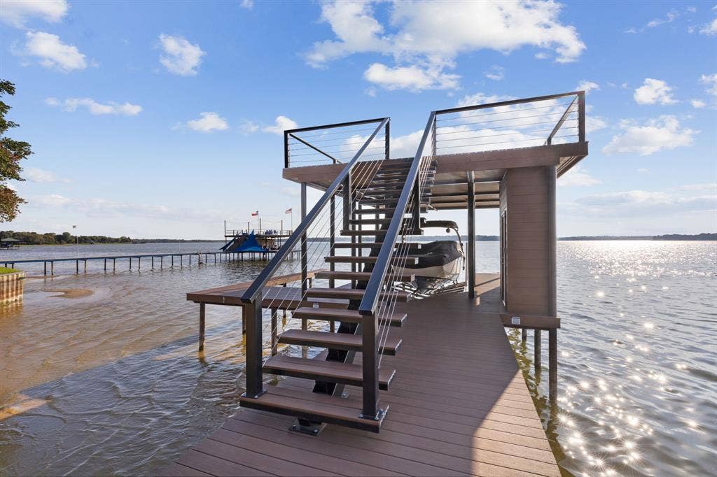 118 The Lee Way, Gun Barrel City, TX 75156 Newer boat dock with 2 boat slips & party deck; positioned when being rebuilt for ease of getting out boat even in dryer seasons.