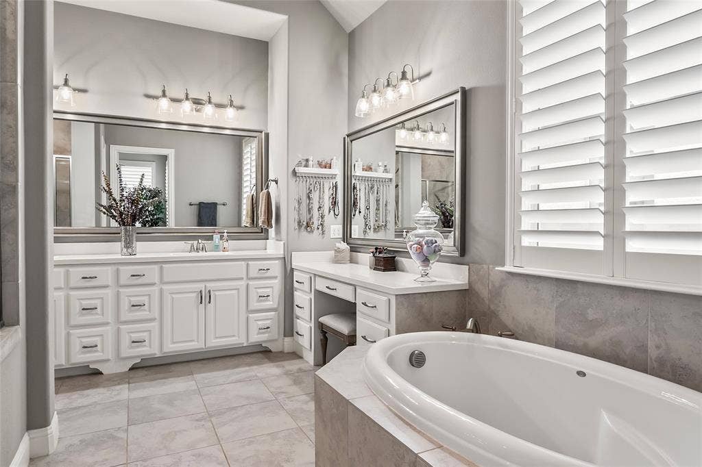 1113 12th Street, Argyle, TX 76226 Bathroom featuring tile patterned floors, vanity, and tiled bath
