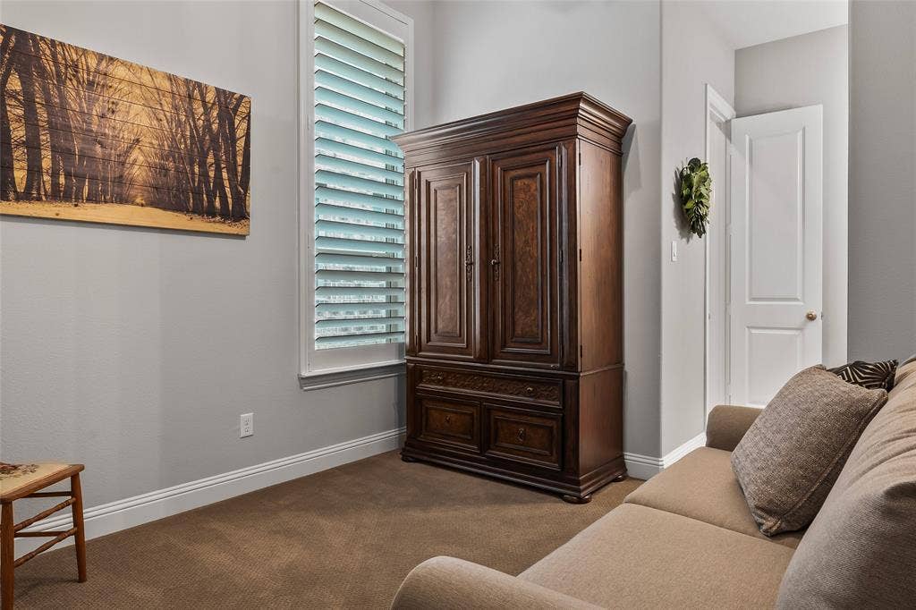 1113 12th Street, Argyle, TX 76226 Living area featuring carpet flooring and plenty of natural light