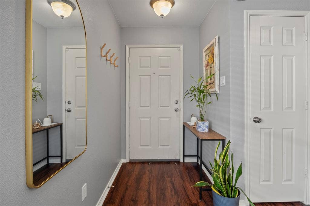 Wood-finish flooring with a light gray wall color