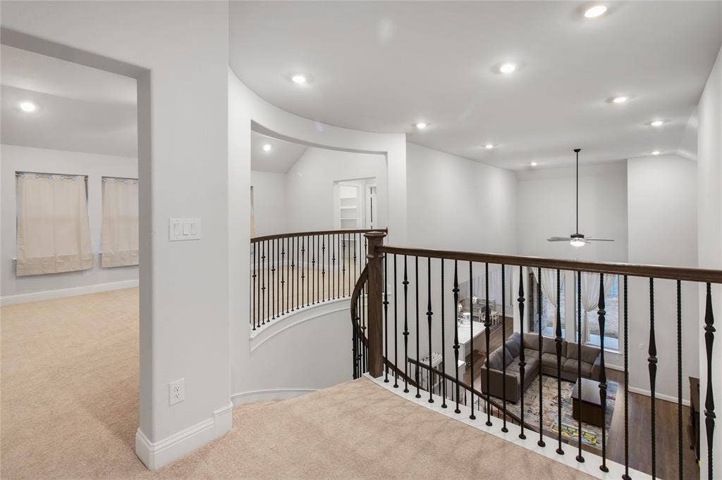 1531 20th street, Argyle, TX 76226 Upper-level landing with carpeted flooring