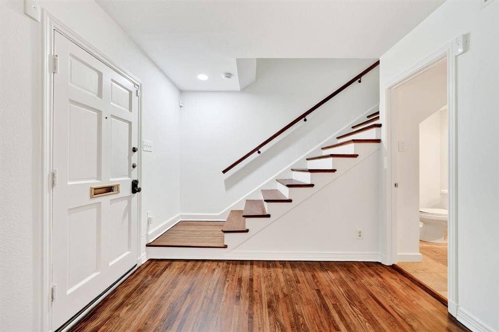 6435 Oriole Drive, #6435, Dallas, TX 75209 View of the entry. Powder bathroom is to the right.