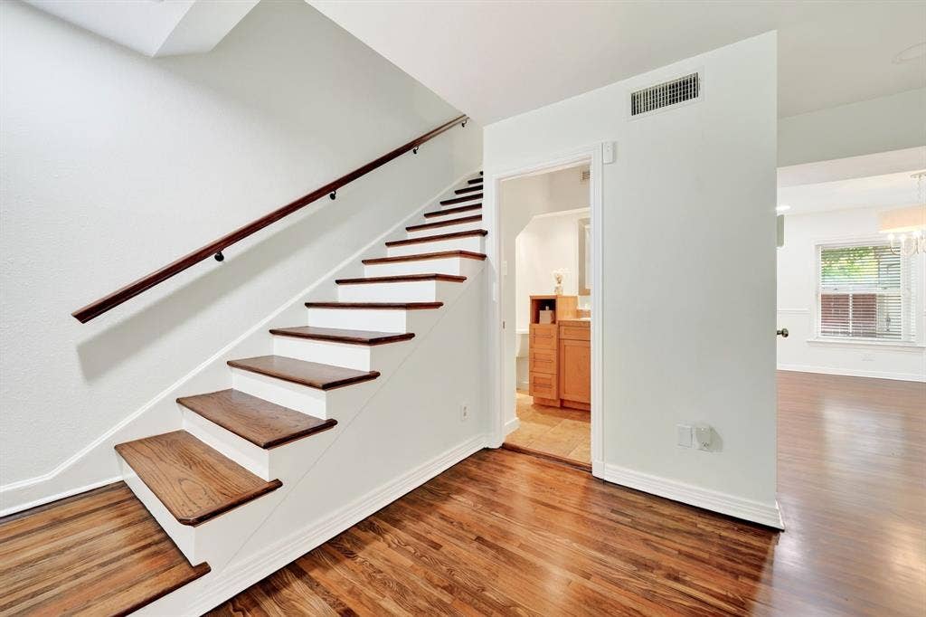 6435 Oriole Drive, #6435, Dallas, TX 75209 Powder room is through the open door.