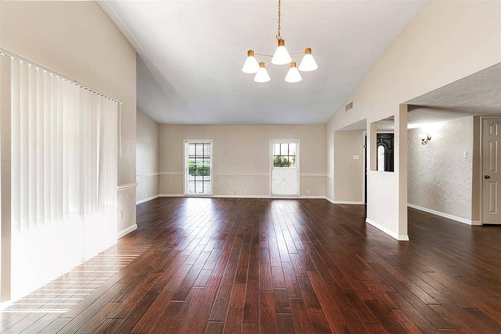 925 Lombardy Drive, Plano, TX 75023 Dining Area And Living Room With Wood Floors