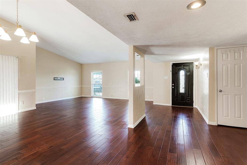 925 Lombardy Drive, Plano, TX 75023 Wood-finish flooring throughout, vaulted ceiling, and recessed lighting