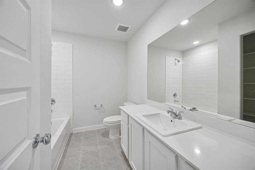 Bathroom in the Oak II home plan by Trophy Signature Homes – REPRESENTATIVE PHOTO