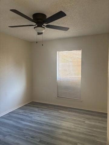 2805 Woodmont Trail, Fort Worth, TX 76133 Wood-finish flooring, ceiling fan with integrated lighting, and window with blinds