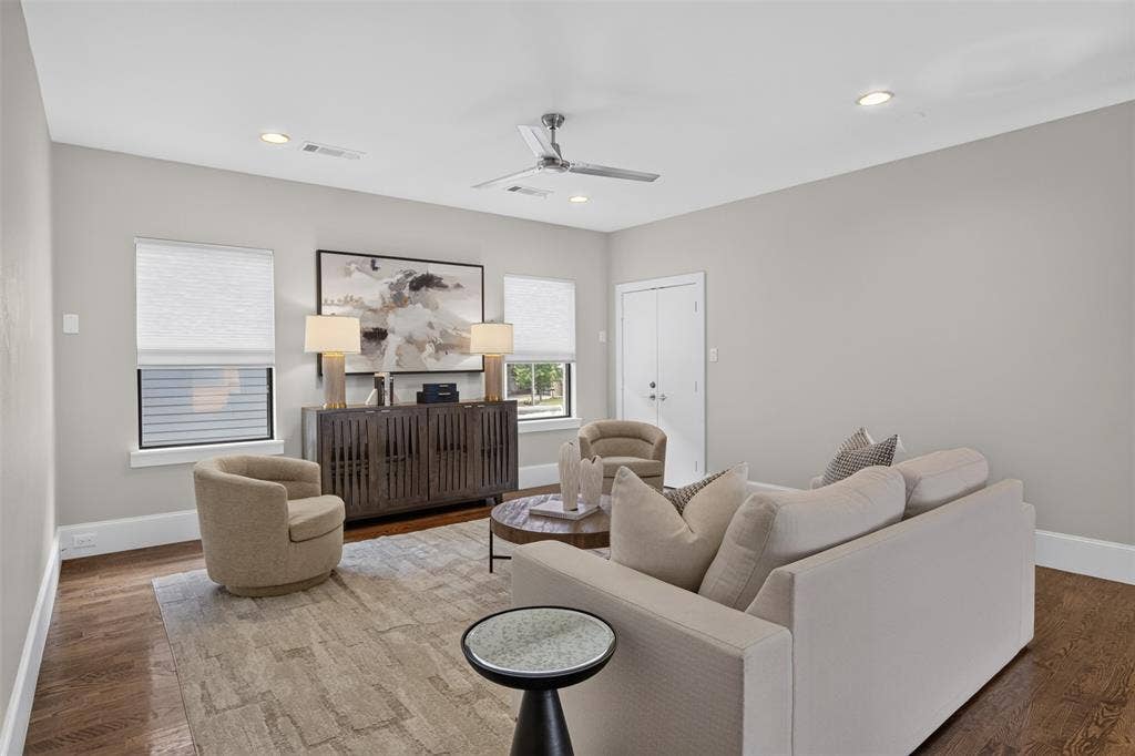5328 Manett Street, Dallas, TX 75206 Hardwood flooring, recessed lighting, ceiling fan, white window treatments, and a solid wood double door