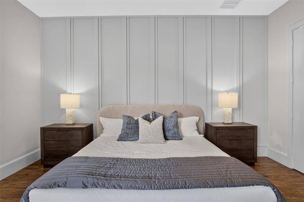 5328 Manett Street, Dallas, TX 75206 Wall paneling accent, wood-finish flooring, recessed lighting, white trim, and baseboards