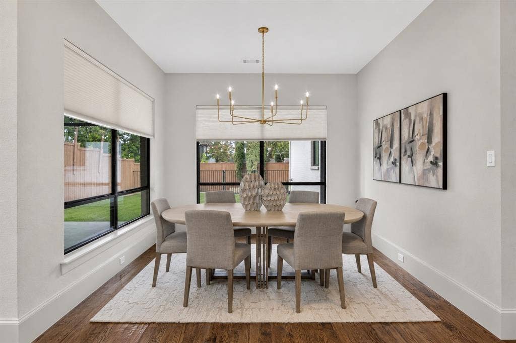 5328 Manett Street, Dallas, TX 75206 Hardwood flooring, recessed lighting, and a modern chandelier