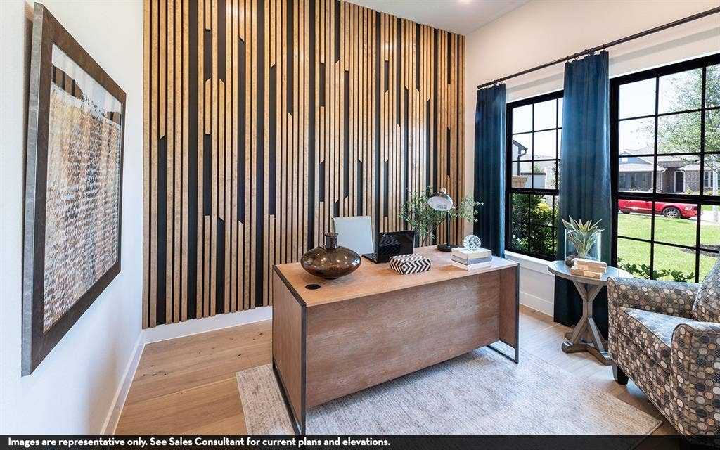 810 Metcalf Drive, Princeton, TX 75071 Accent wall with vertical wood paneling