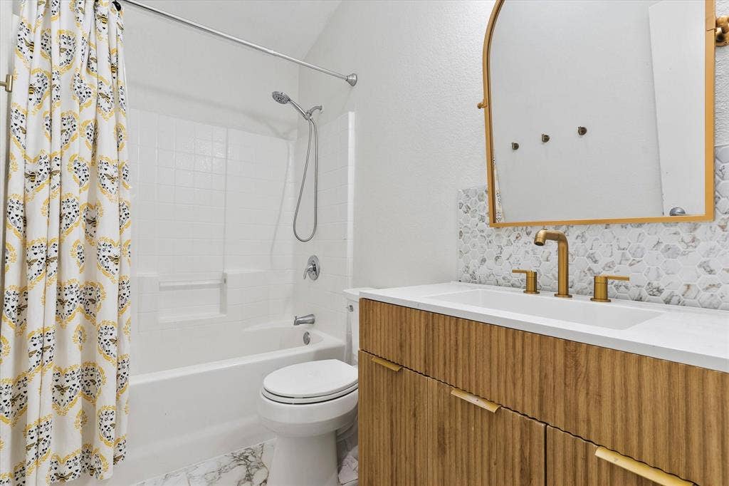6241 Adonia Drive, Fort Worth, TX 76131 Remodeled with updated tub/shower and vanity.