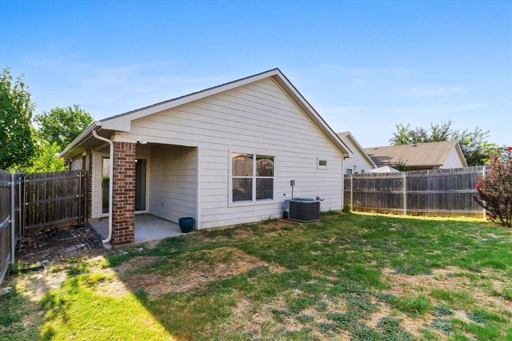 6241 Adonia Drive, Fort Worth, TX 76131 Covered patio and fenced back yard