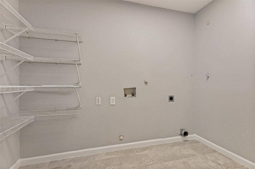 Laundry & Pantry located off Kitchen and Garage.