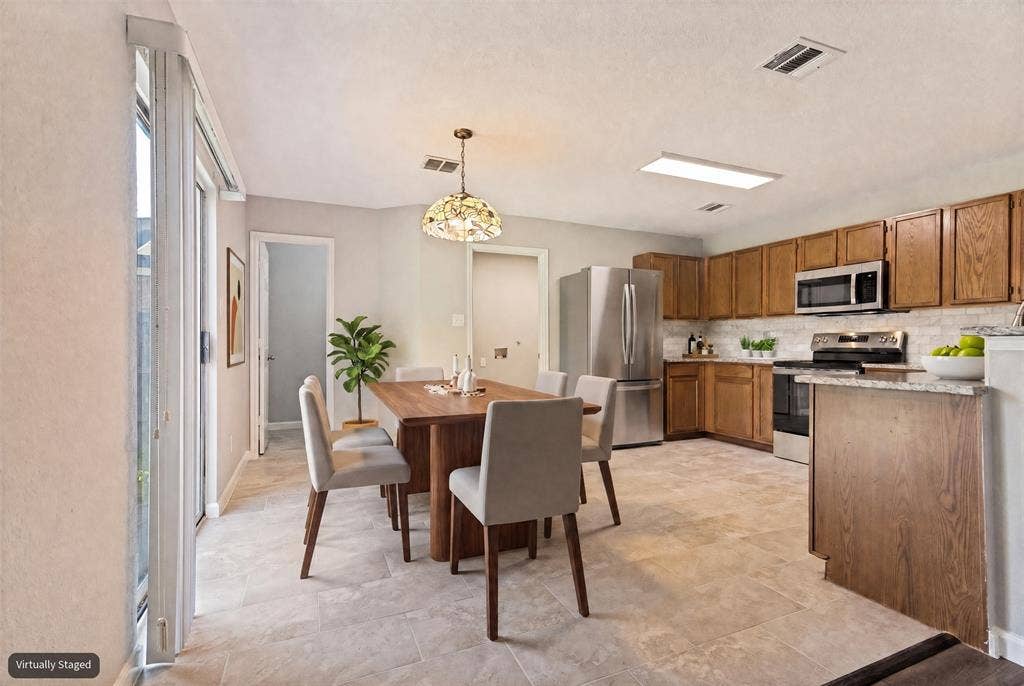Dining Area near Kitchen overlooking the Living Room