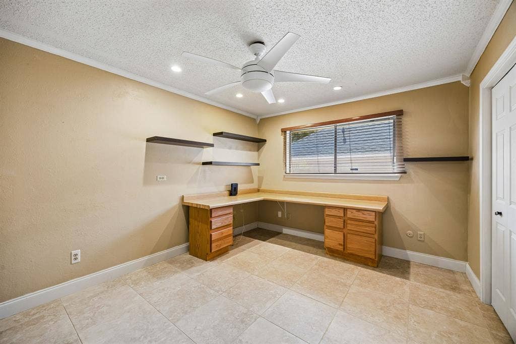 This fourth bedroom is split from the others with access to a full bath