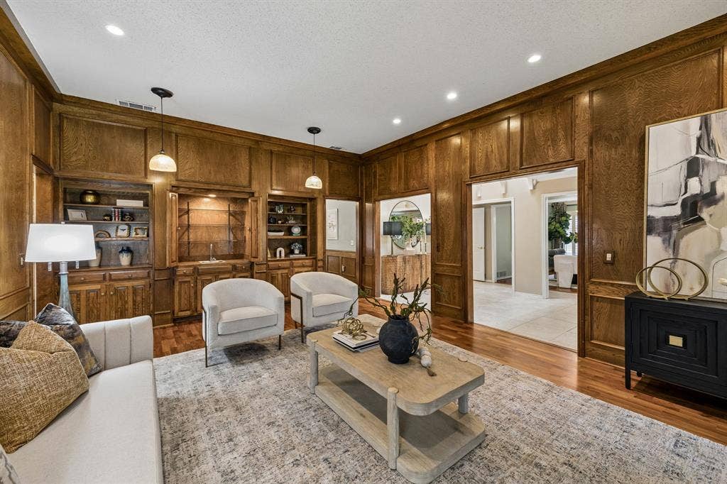 The living room opens to the entry and is across from the formal dining room offering a great flow for entertaining.
