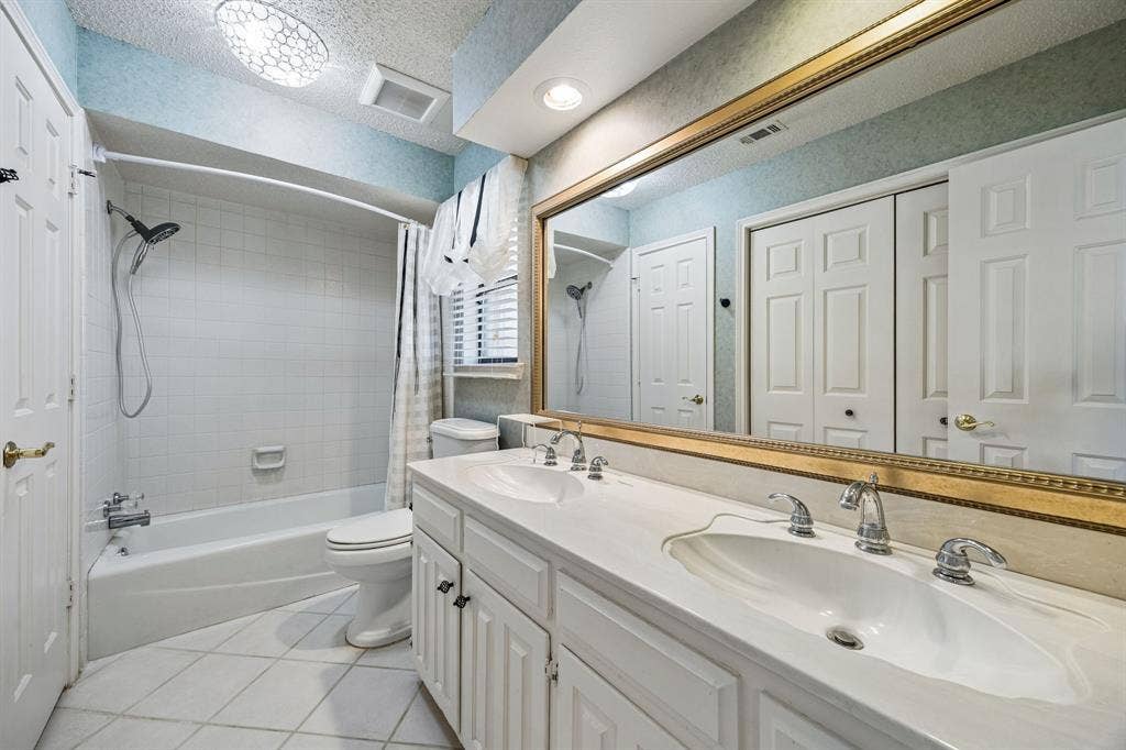 The Jack-n-Jill bathroom adjoins the second and third bedrooms.