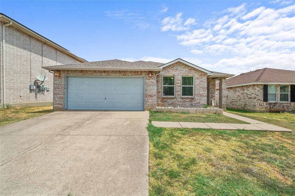 8421 Cotton Valley Lane, Arlington, TX 76002 Single-story exterior with brick facade, attached garage, concrete driveway, and front walkway