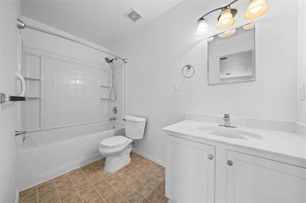 8421 Cotton Valley Lane, Arlington, TX 76002 White vanity with integrated sink and chrome faucet