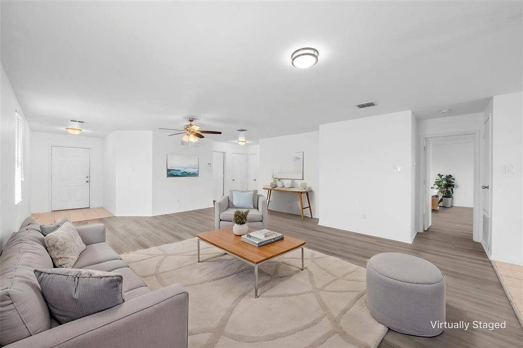 8421 Cotton Valley Lane, Arlington, TX 76002 Recessed lighting, wood-finish flooring, ceiling fan, white walls, and a light-colored entry door